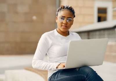 black-girl-summer-city-with-laptop_1157-37971